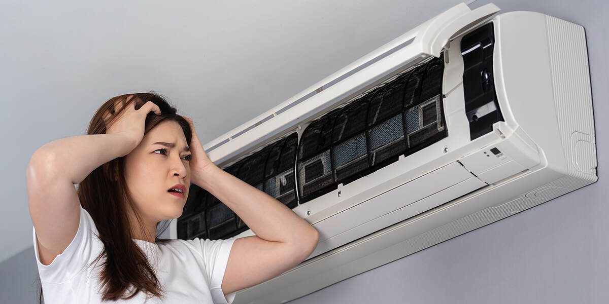 why is my ac blowing warm air